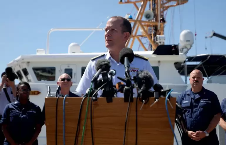 Rear Admiral John Mauger, First Coast Guard District commander, speaks during a press conference updating about the search for the missing OceanGate E